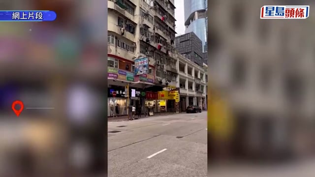 旺角驚現兩男簷篷及招牌頂「行鋼線」爬入屋 市民目擊拍片猜測動機