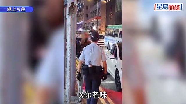 西環Tesla疑違交通例 外籍男爆粗與警爭執 向路人豎中指遭警喝止:唔好攞彩