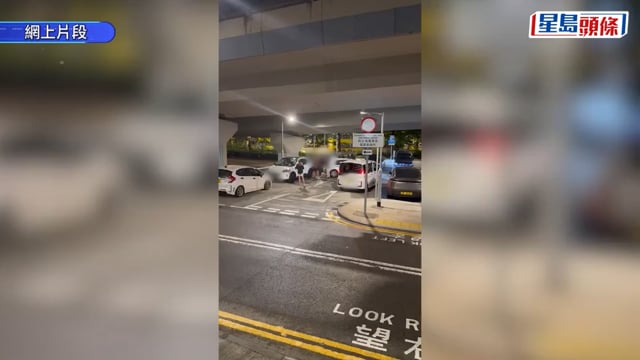 長沙灣兩男女為泊車爆粗互鬧 中年漢突然插水扮受傷 網民:做多咗