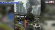 九龍灣啓福道的士起火 消防到場撲熄