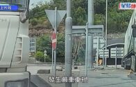 屯赤貨櫃車剷上石壆 司機被困救出昏迷送院