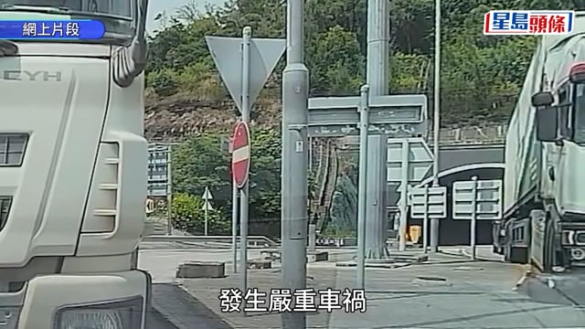 屯赤貨櫃車剷上石壆 司機被困救出昏迷送院